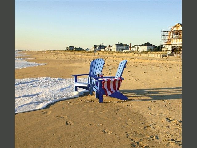 blue chairs on beach